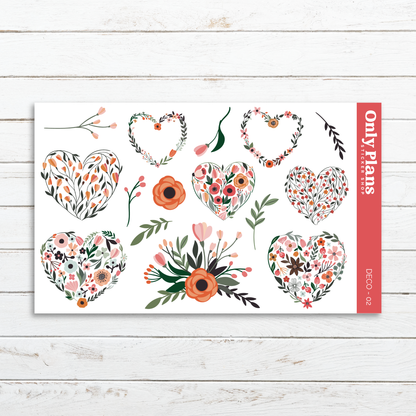 a card with flowers and hearts on it