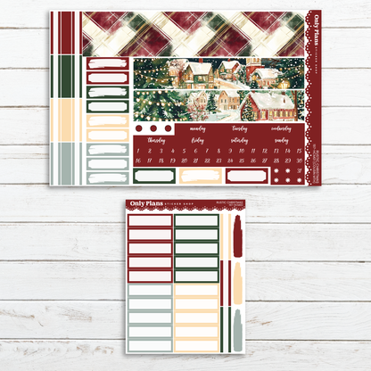 two christmas planner stickers on a wooden surface