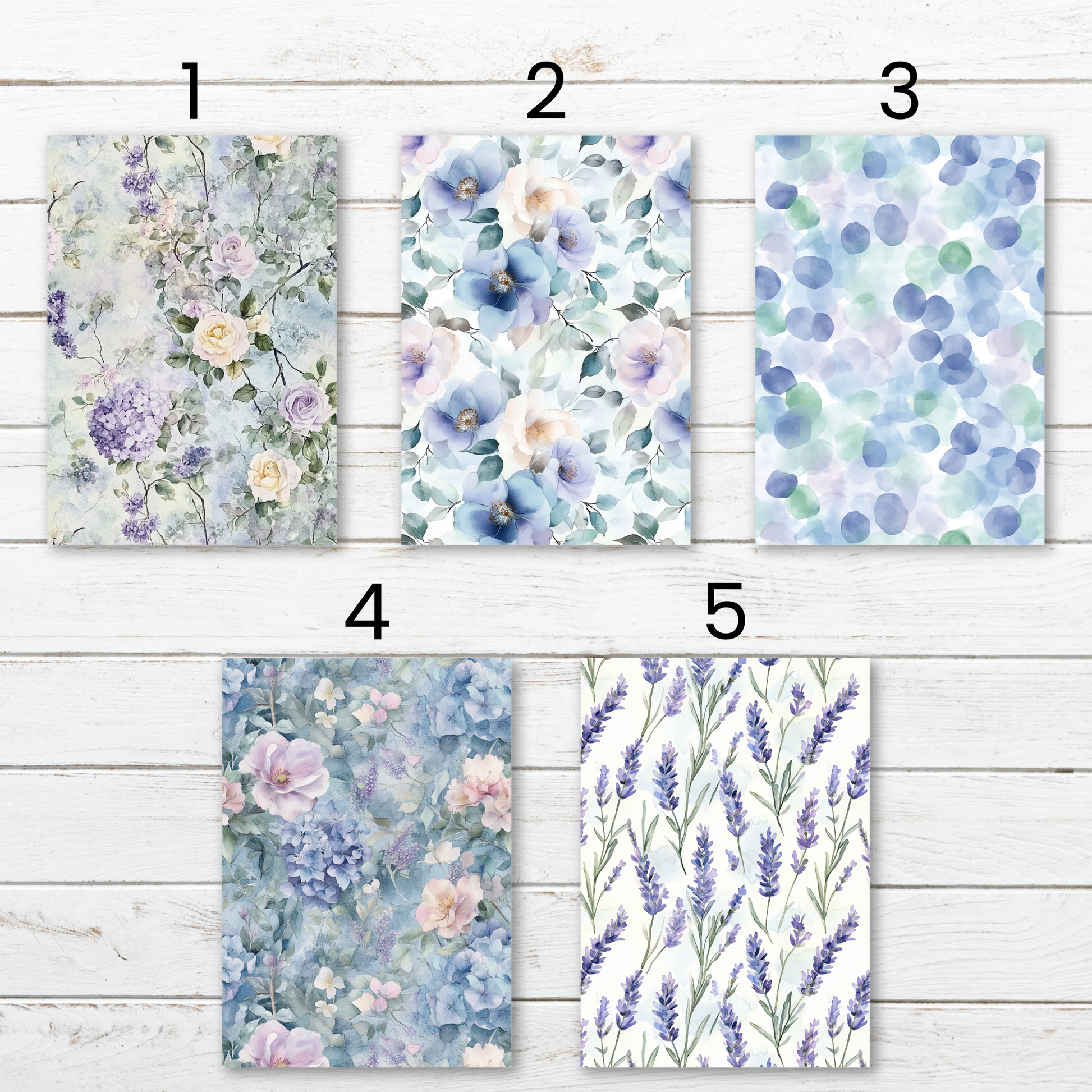 a set of four watercolor flowers on a white wood background