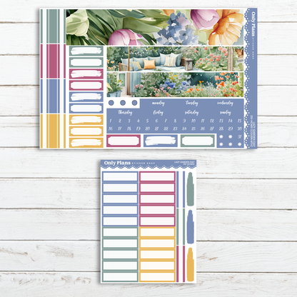 a planner sticker with flowers and plants on it