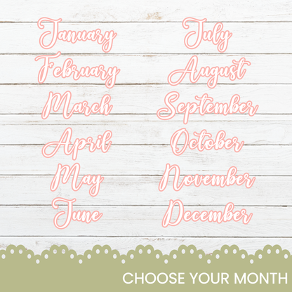 the months of the month are shown on a white wooden background