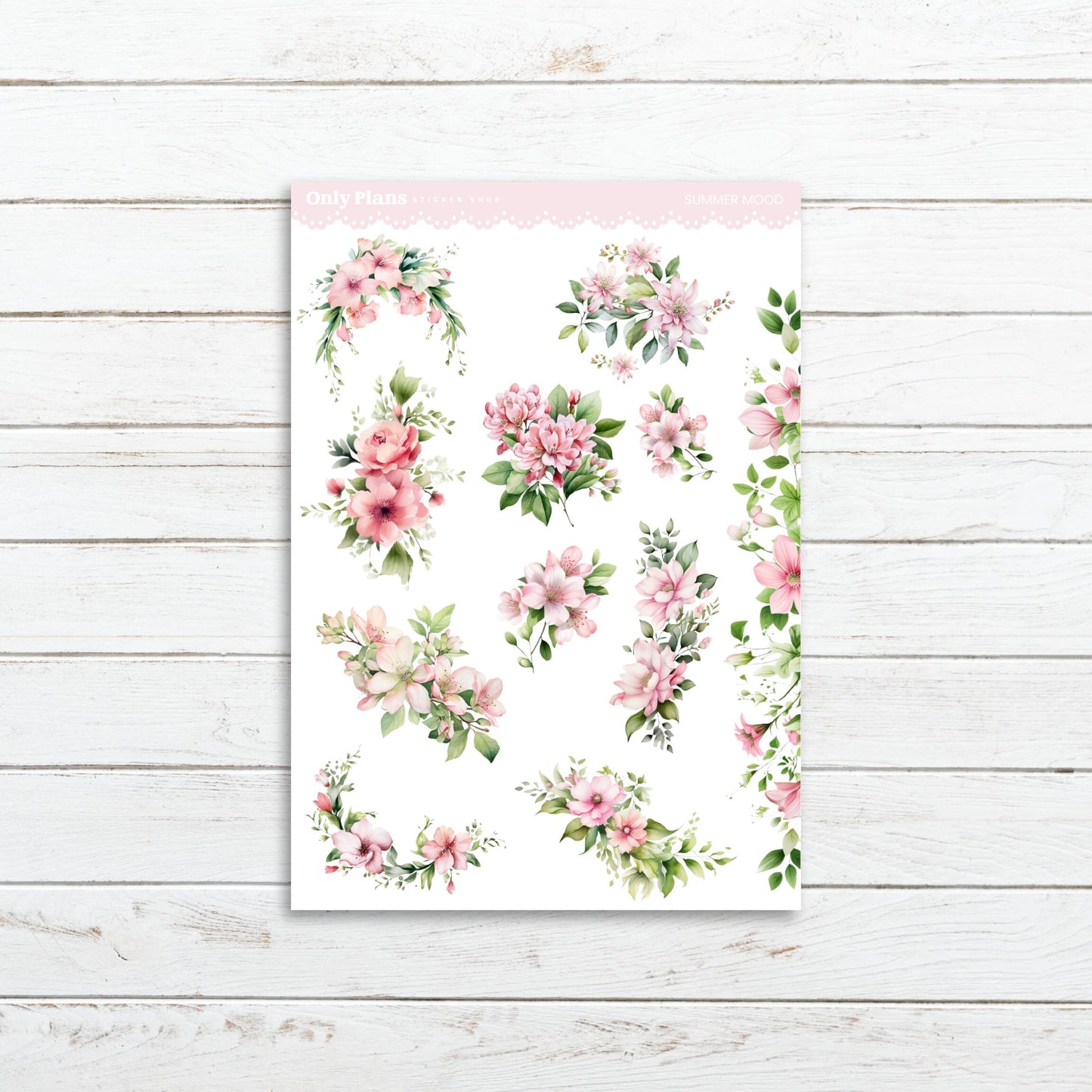 a sheet of paper with pink flowers on it