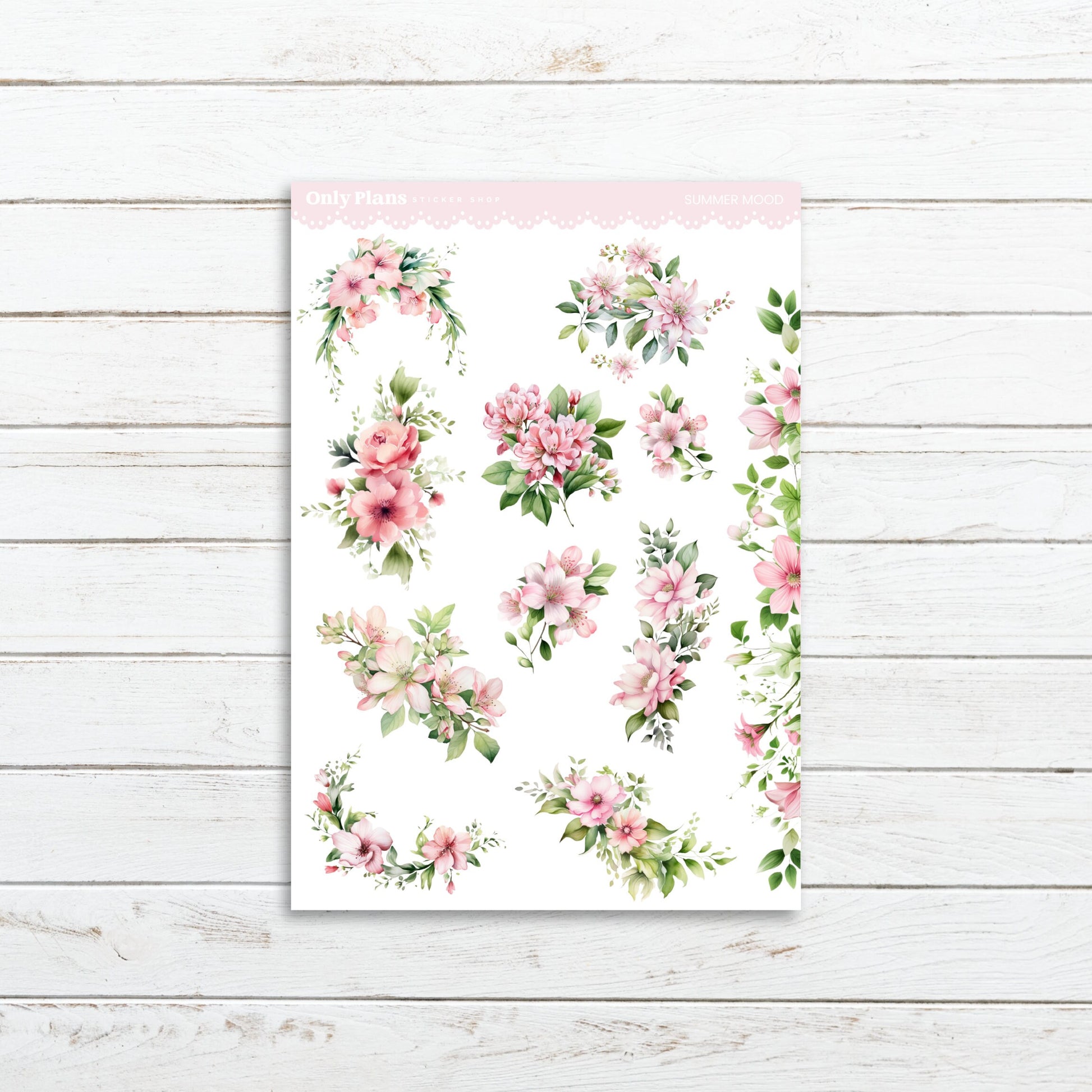 a sheet of paper with pink flowers on it