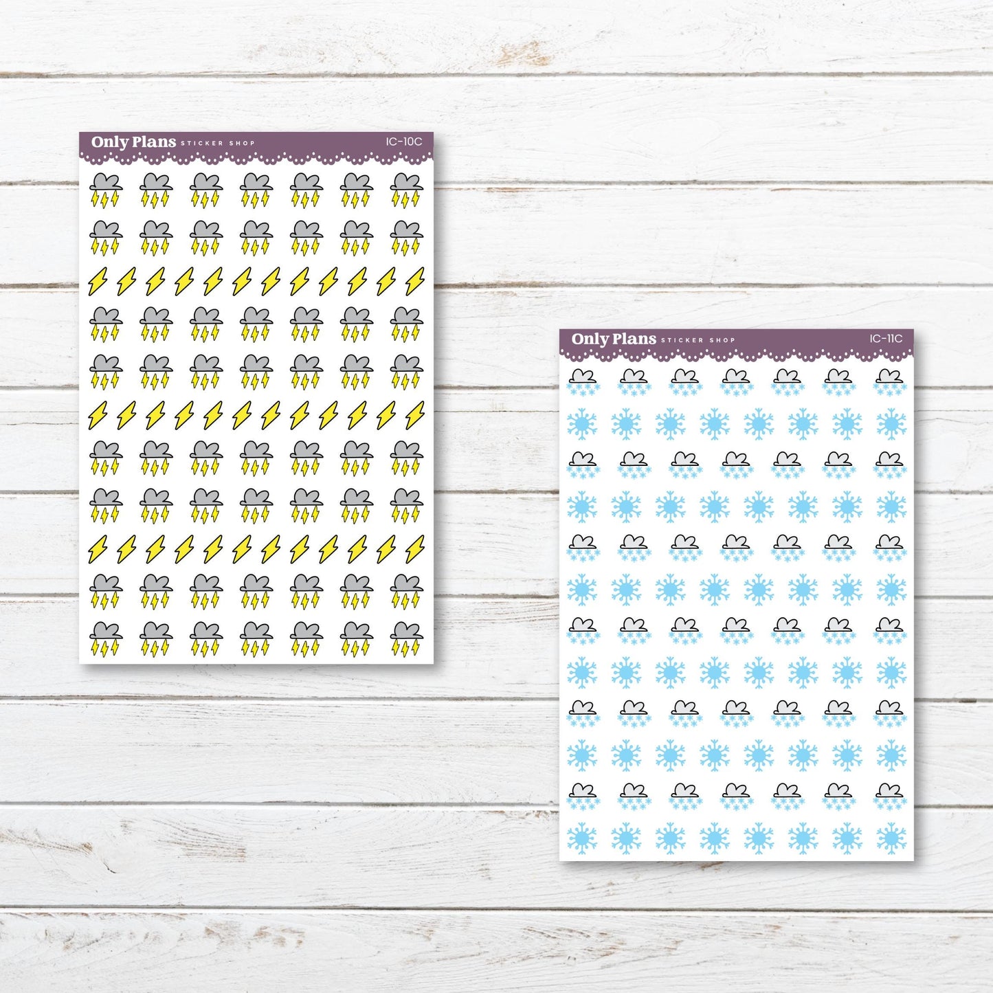 two planner stickers on a wooden surface