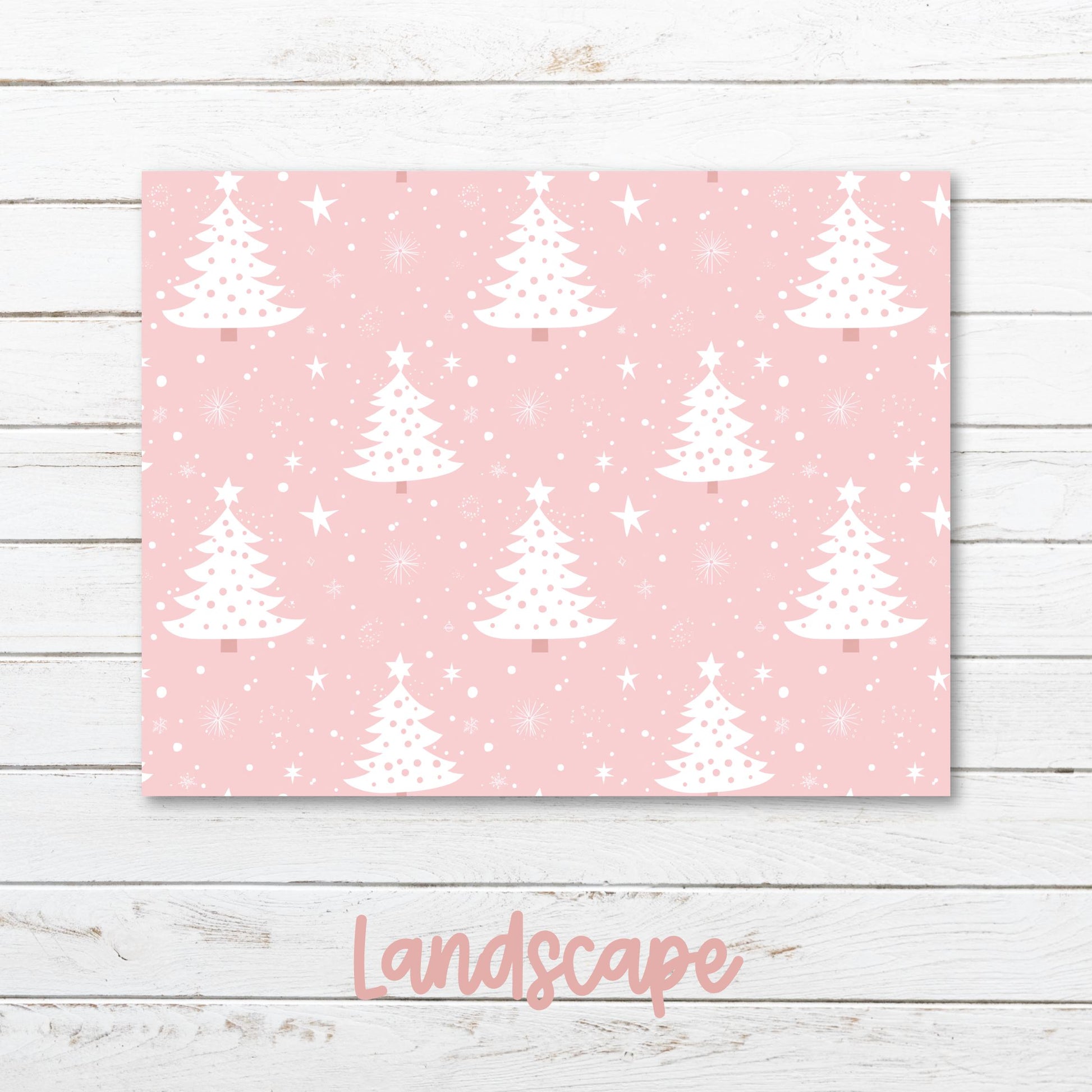 a pink background with white christmas trees on it