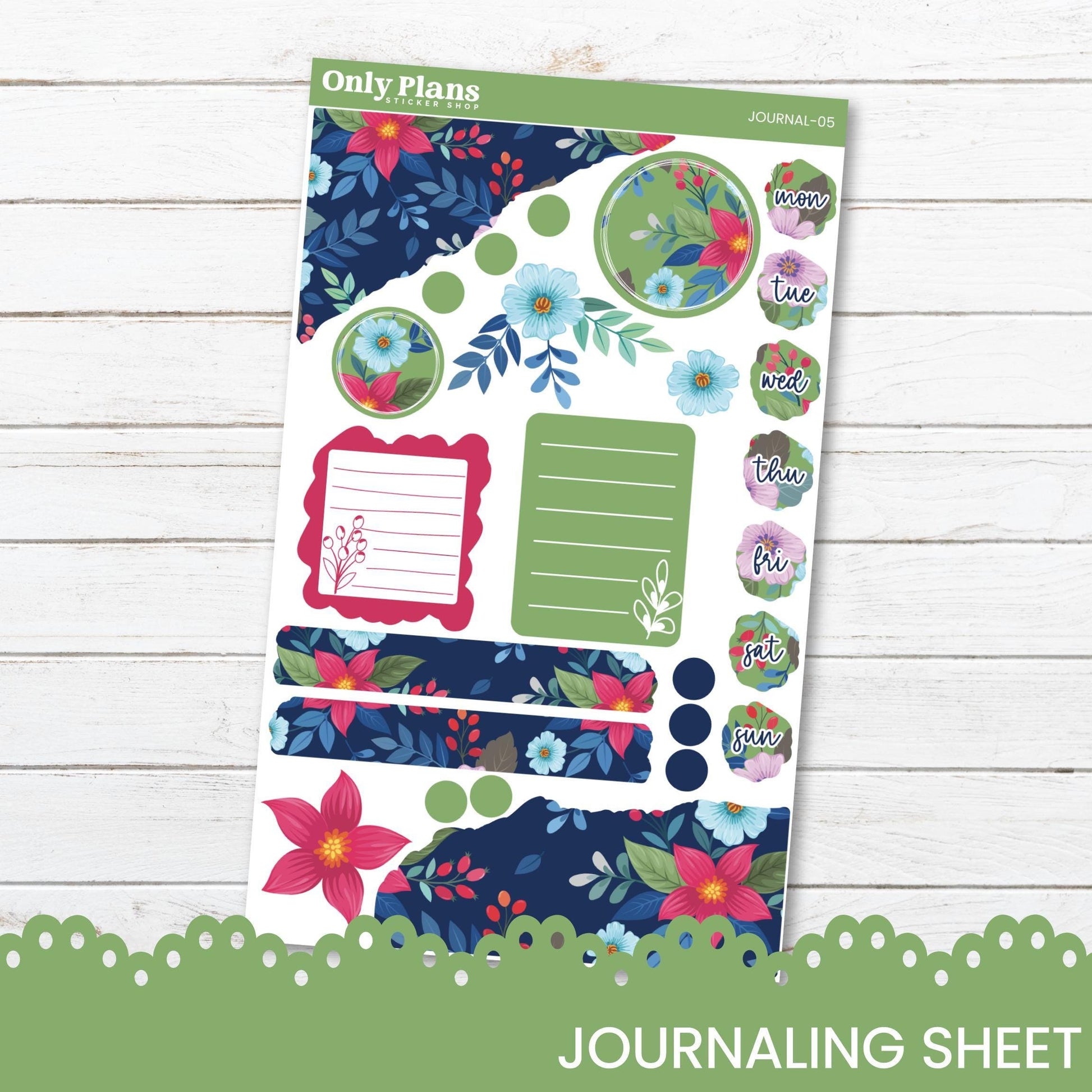 a floral planner sticker sheet on a wooden surface