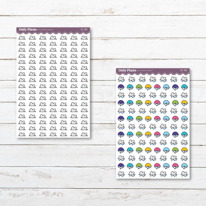 two planner stickers with different designs on them