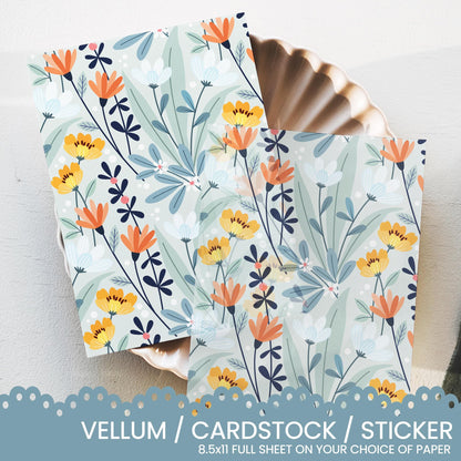 a stack of cardstocks with a flower pattern on them