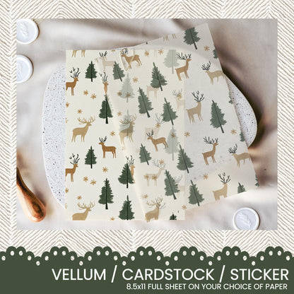 a set of four christmas themed napkins with deer and trees on them