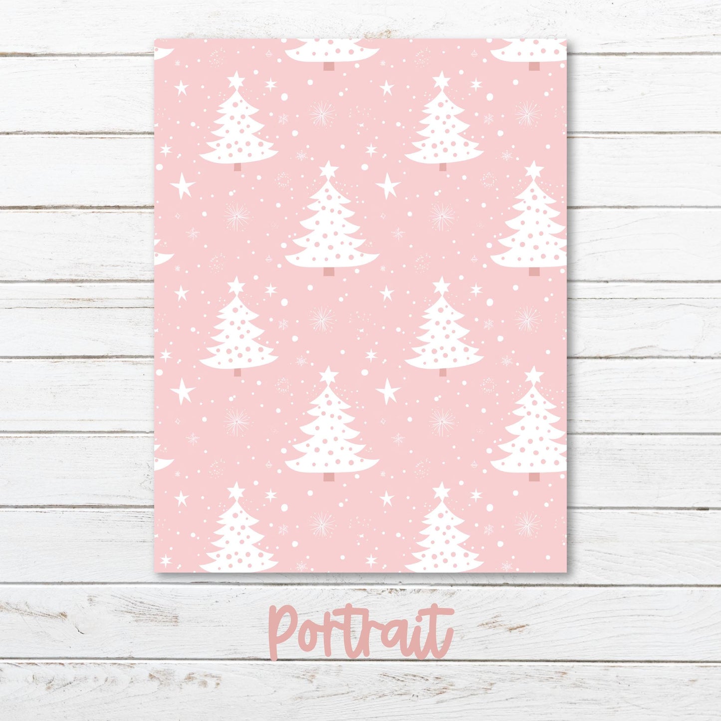 a pink christmas card with white trees on it