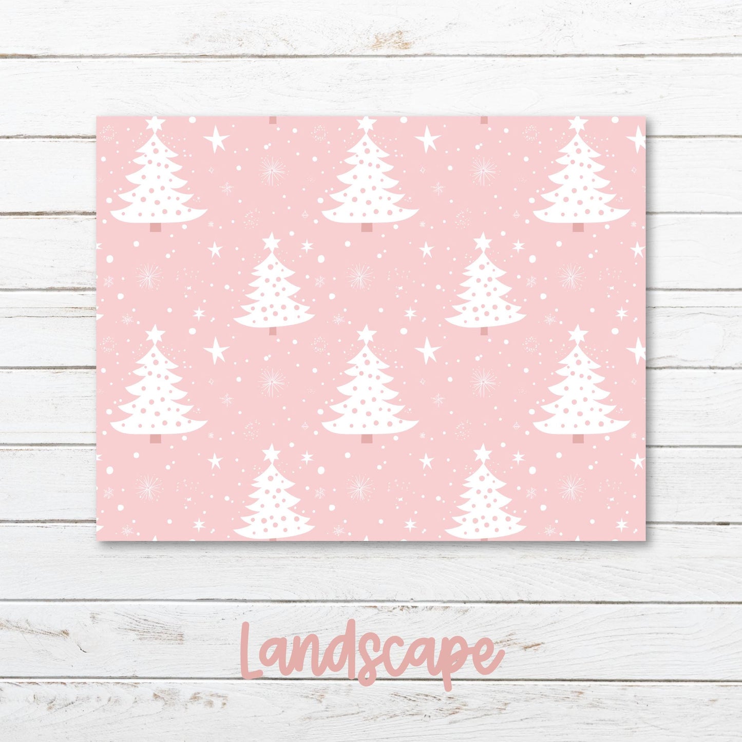 a pink background with white christmas trees on it