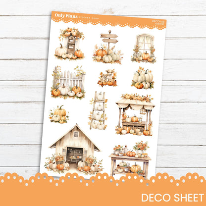 a sticker sheet with pumpkins and a house